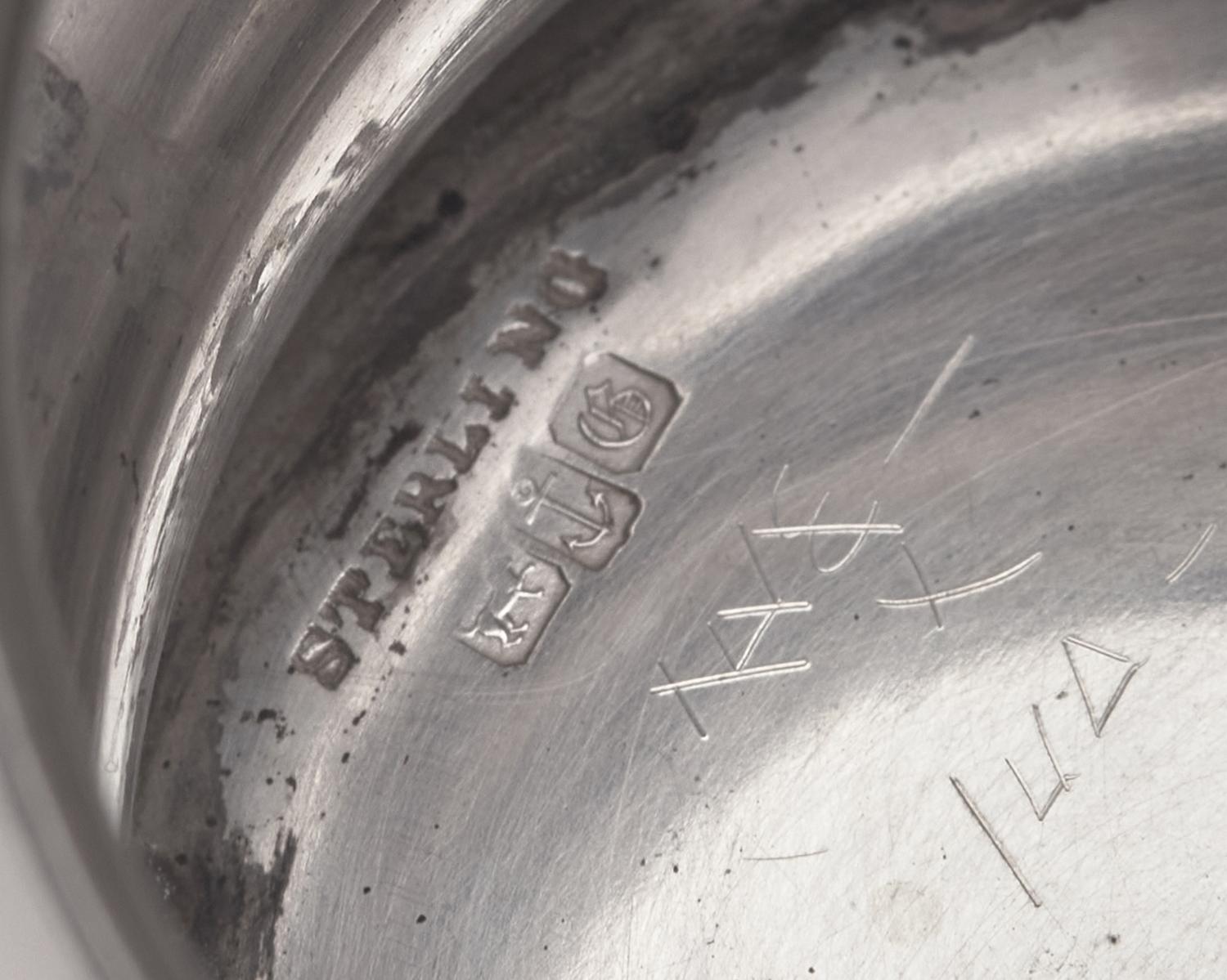 A Three-Handled Sterling Silver Presentation Cup