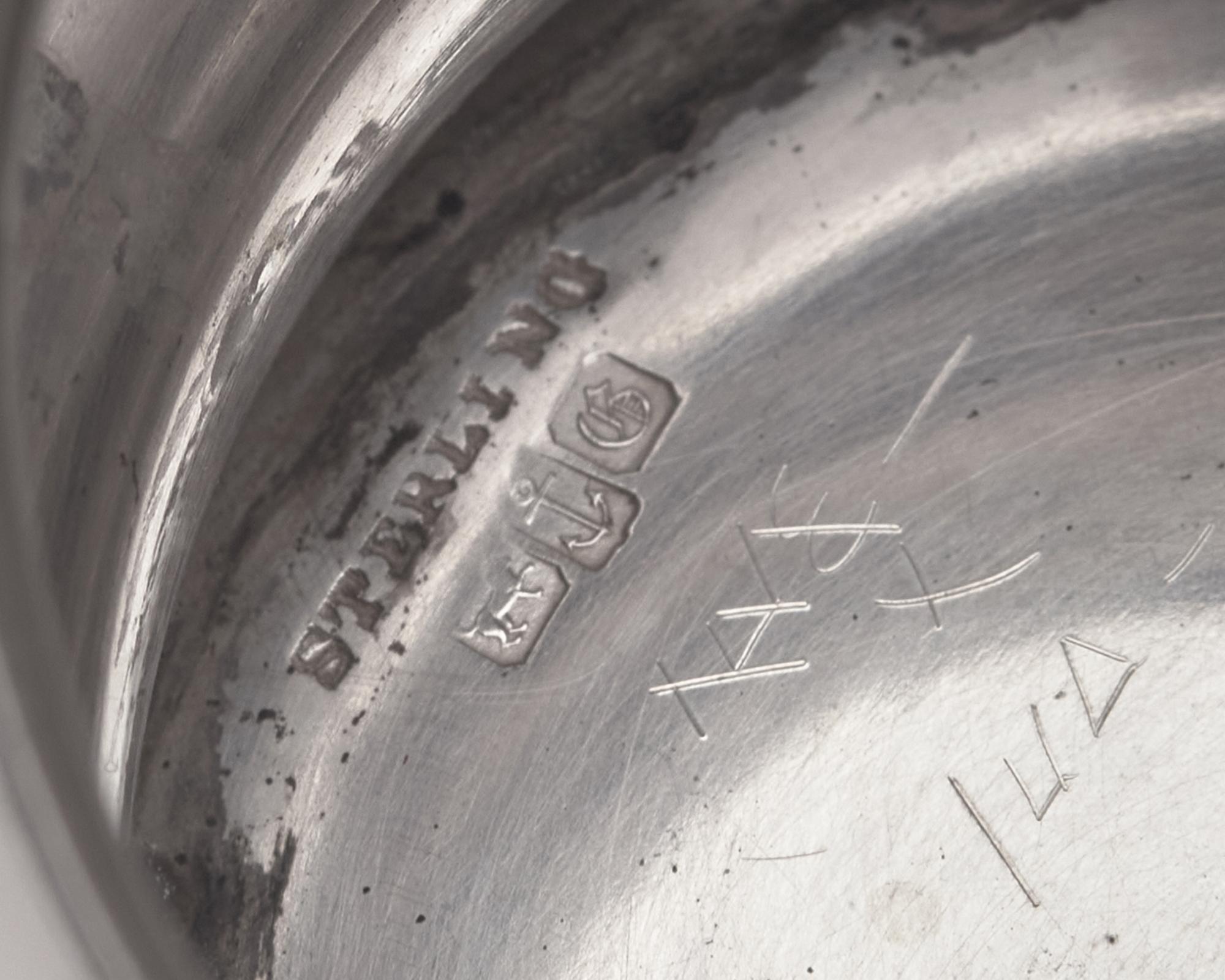 A Three-Handled Sterling Silver Presentation Cup
