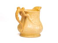 A Large Swan Hill Pottery Molded Yellowware Ice Water Pitcher