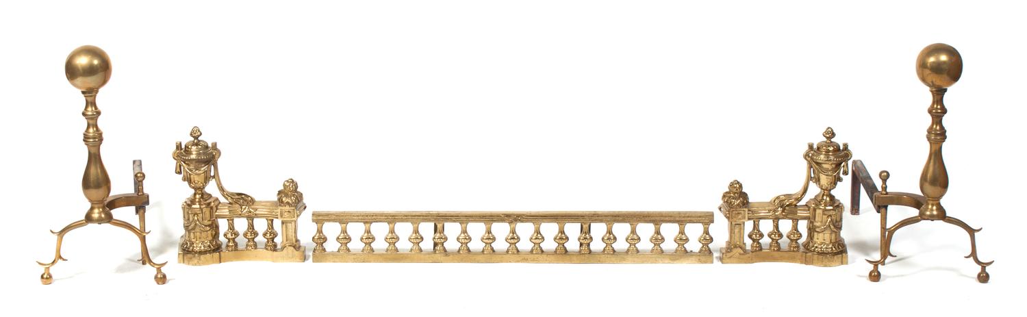 A Group of Brass Fireplace Articles Height of andirons 19 inches.