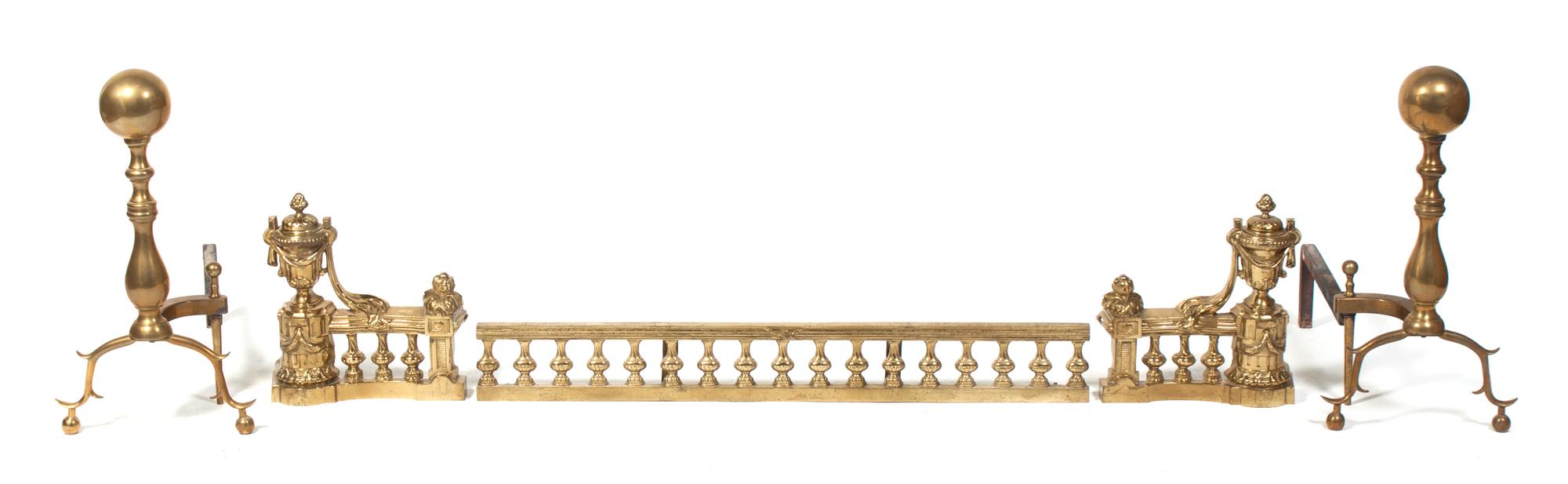 A Group of Brass Fireplace Articles Height of andirons 19 inches.