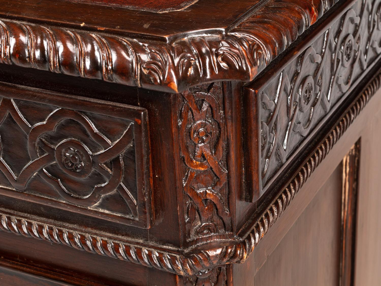 A George III Style Carved Mahogany Pedestal Desk