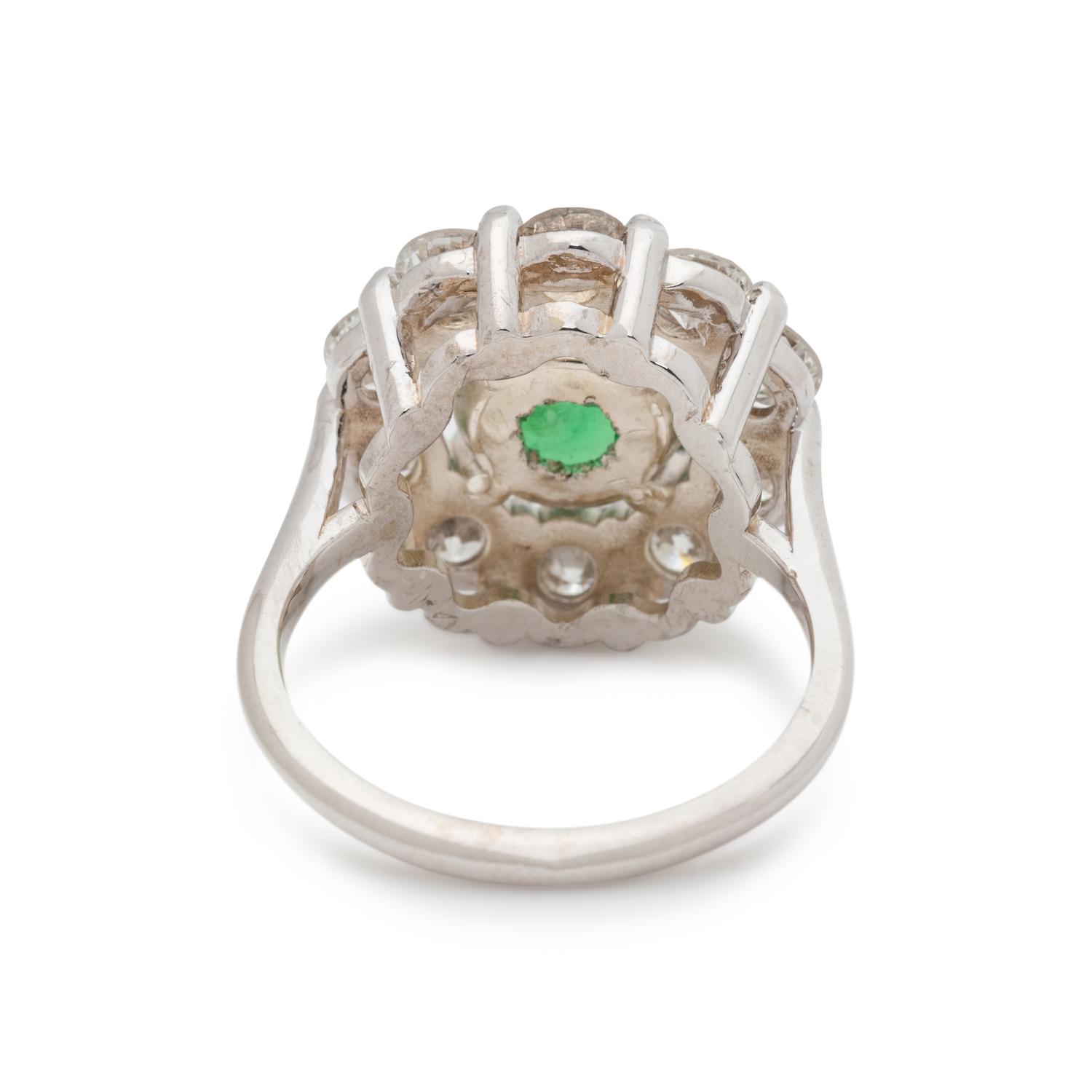 TSAVORITE AND DIAMOND RING