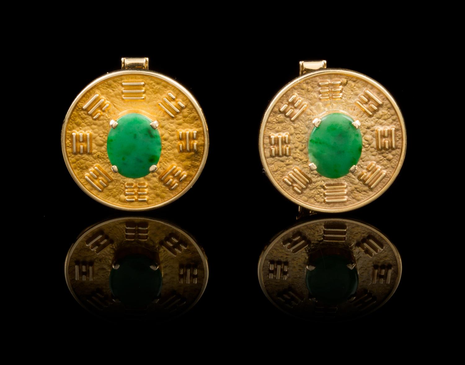 A Pair of 14 Karat Gold and Jadeite Cufflinks Length 3/4 inches.