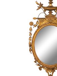 A Neoclassical Style Giltwood Oval Mirror