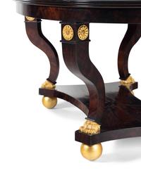 A Regency Style Parcel-Gilt Mahogany Center Table