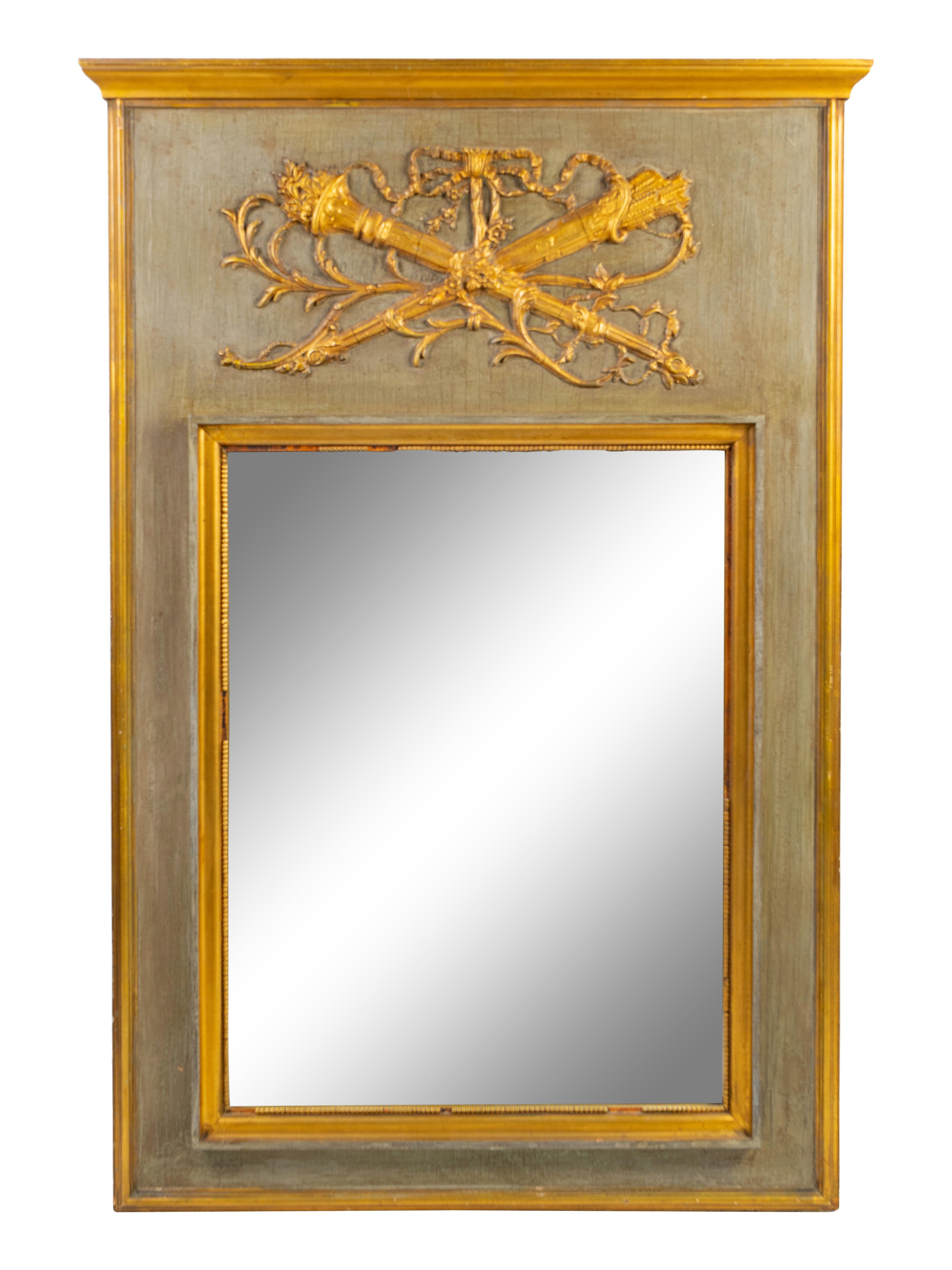A Louis XVI Style Painted and Parcel Gilt Trumeau Mirror