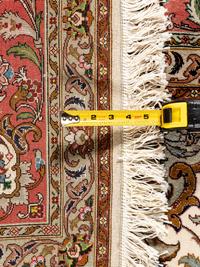 A Tabriz Wool Rug
