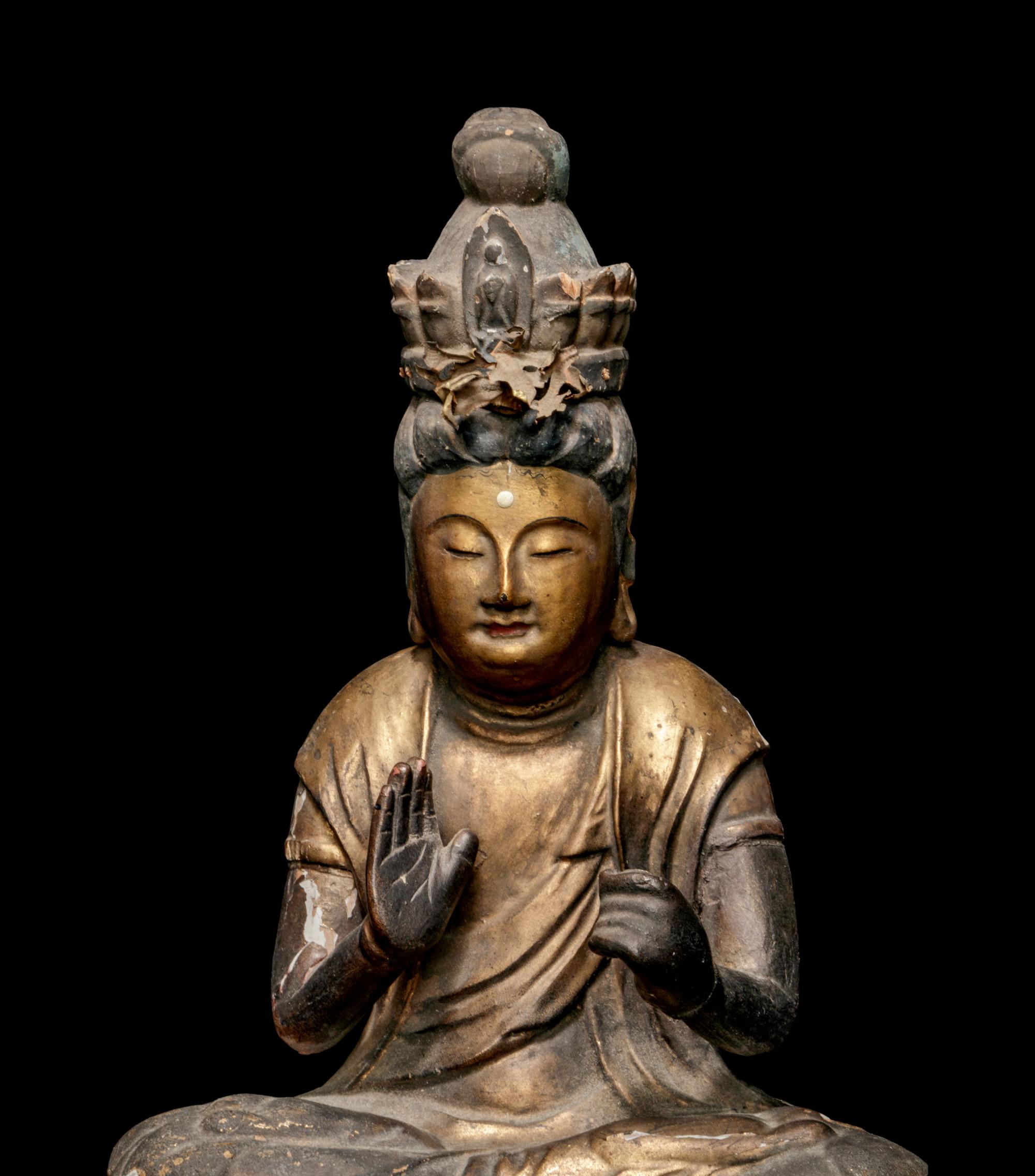 A Gilt Lacquered Wood Figure of Seated Kannan