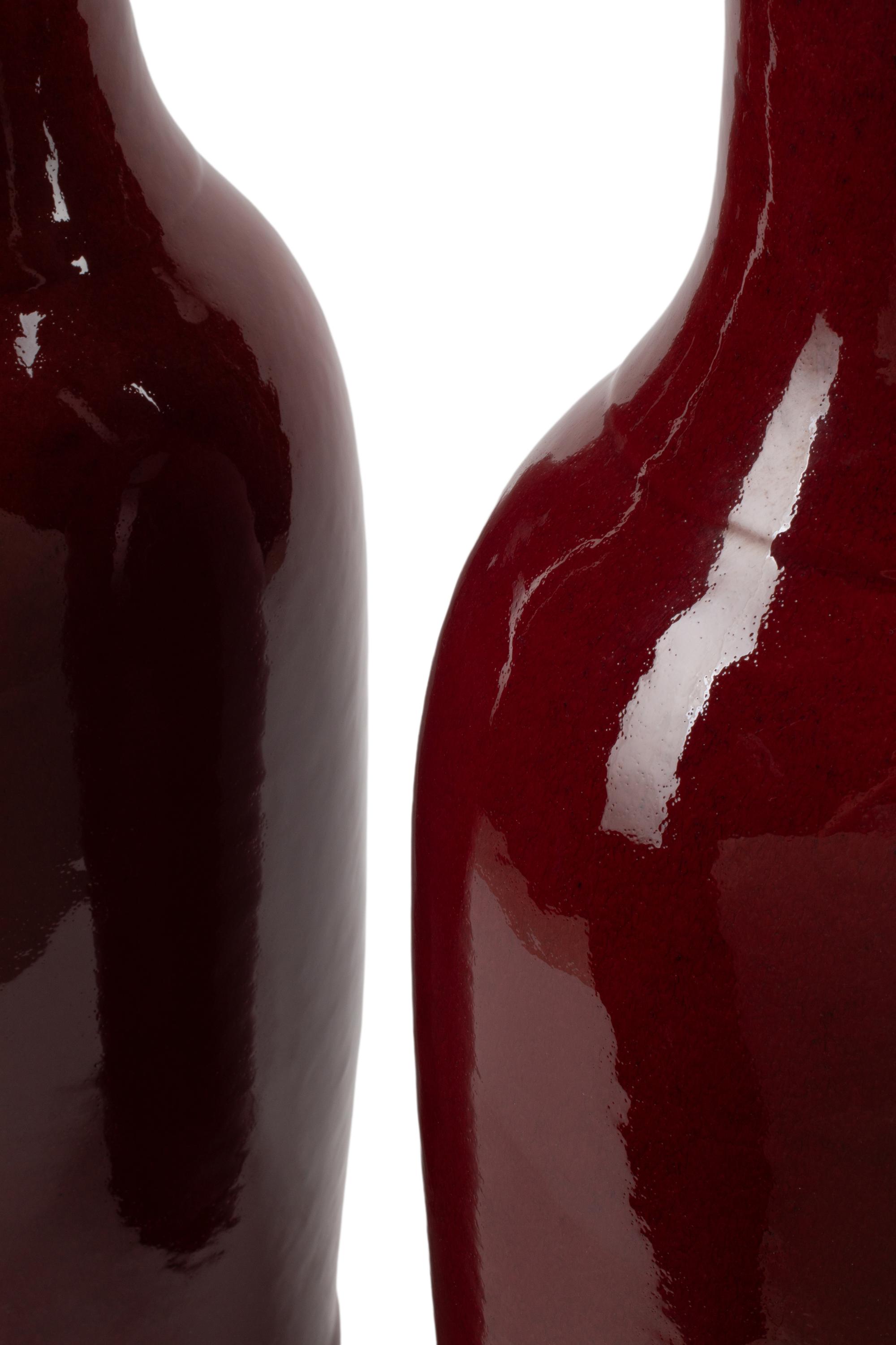 A Pair of Large Sang-de-Boeuf Glazed Ceramic Vases