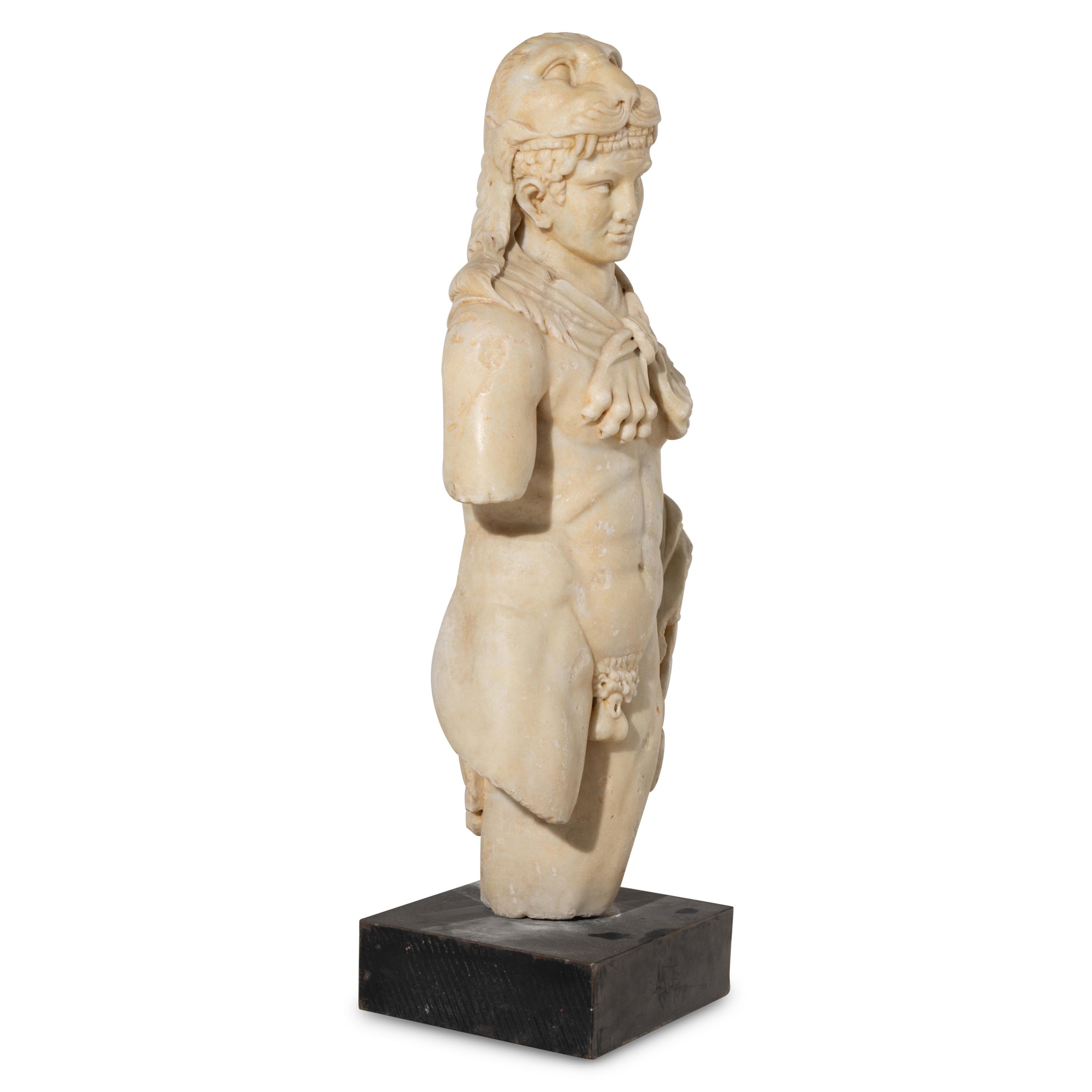 An Italian Carved Marble Torso of Hercules