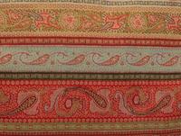 An Indian Paisley Wool Coverlet and Six Pillows