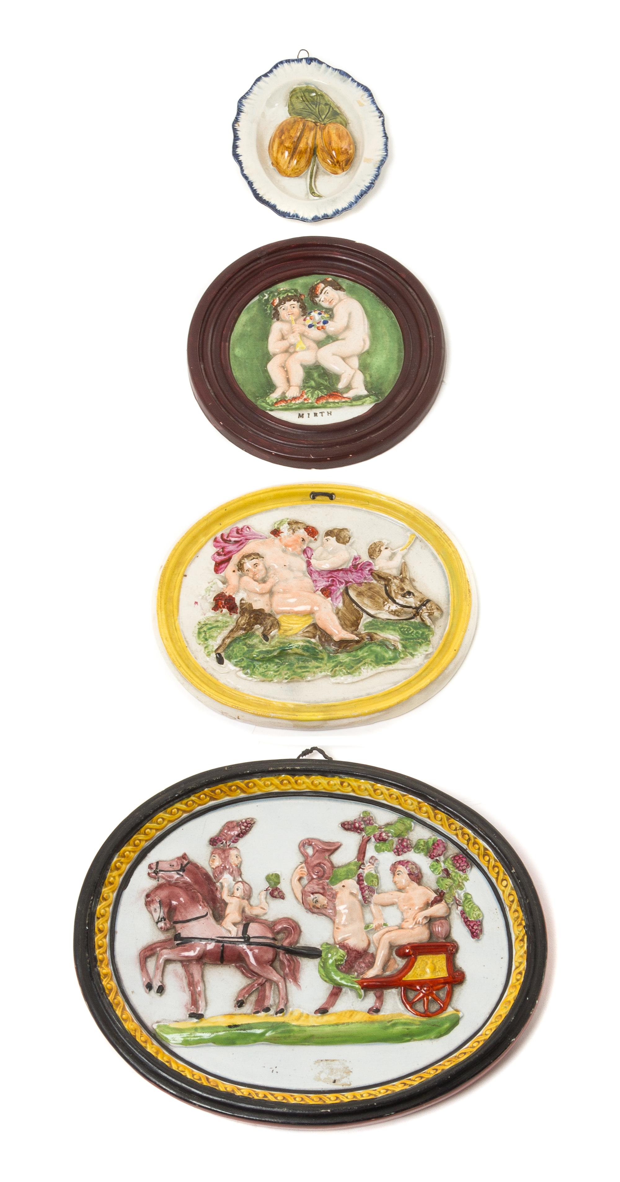 Four Ceramic Wall Plaques Width of widest 9 1/4 inches. — 19TH/20TH CENTURY