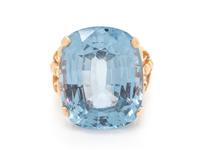 A 14 Karat Yellow Gold and Synthetic Blue Spinel Ring,
