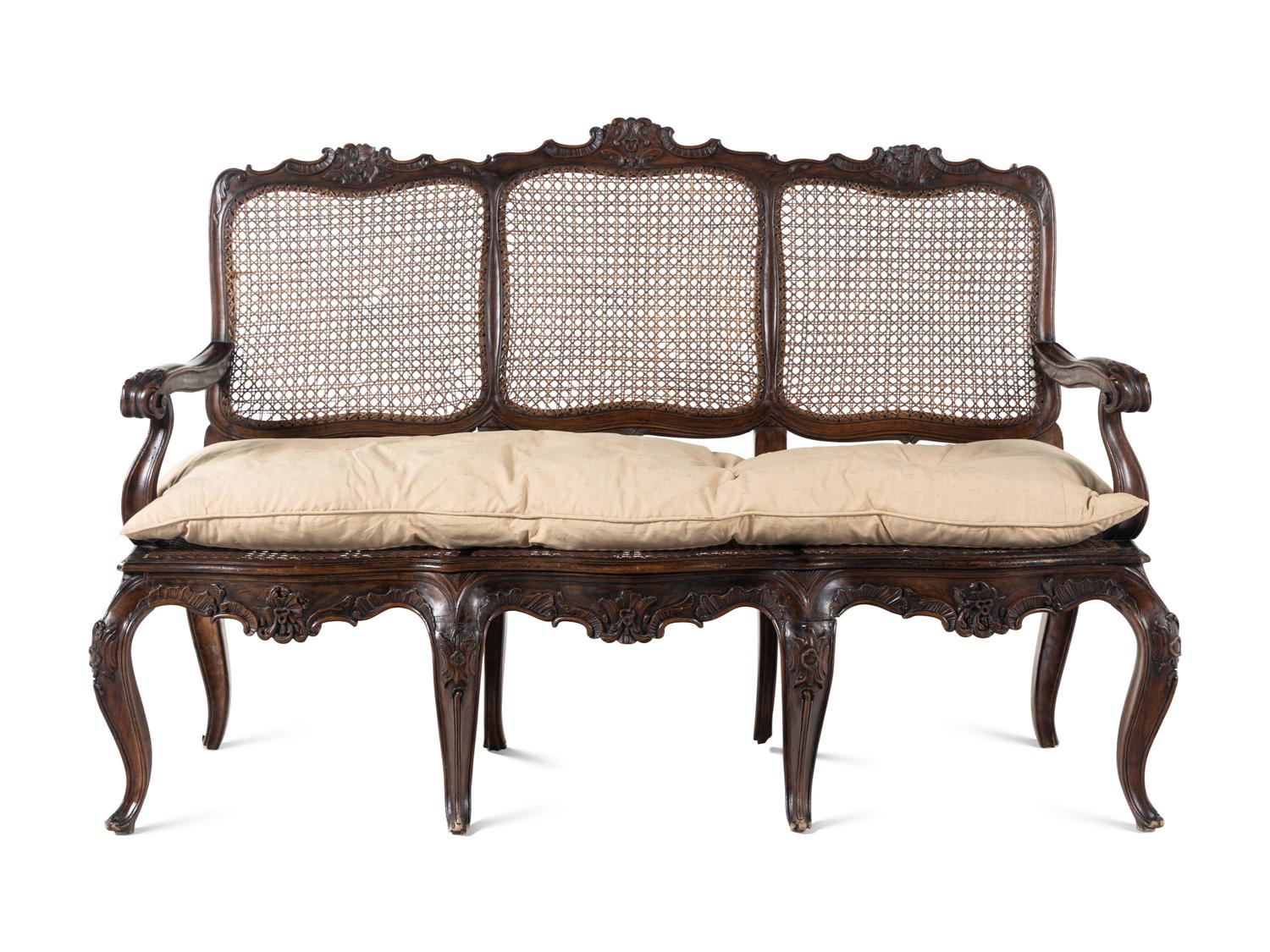 An Italian Rococo Style Carved Walnut Settee