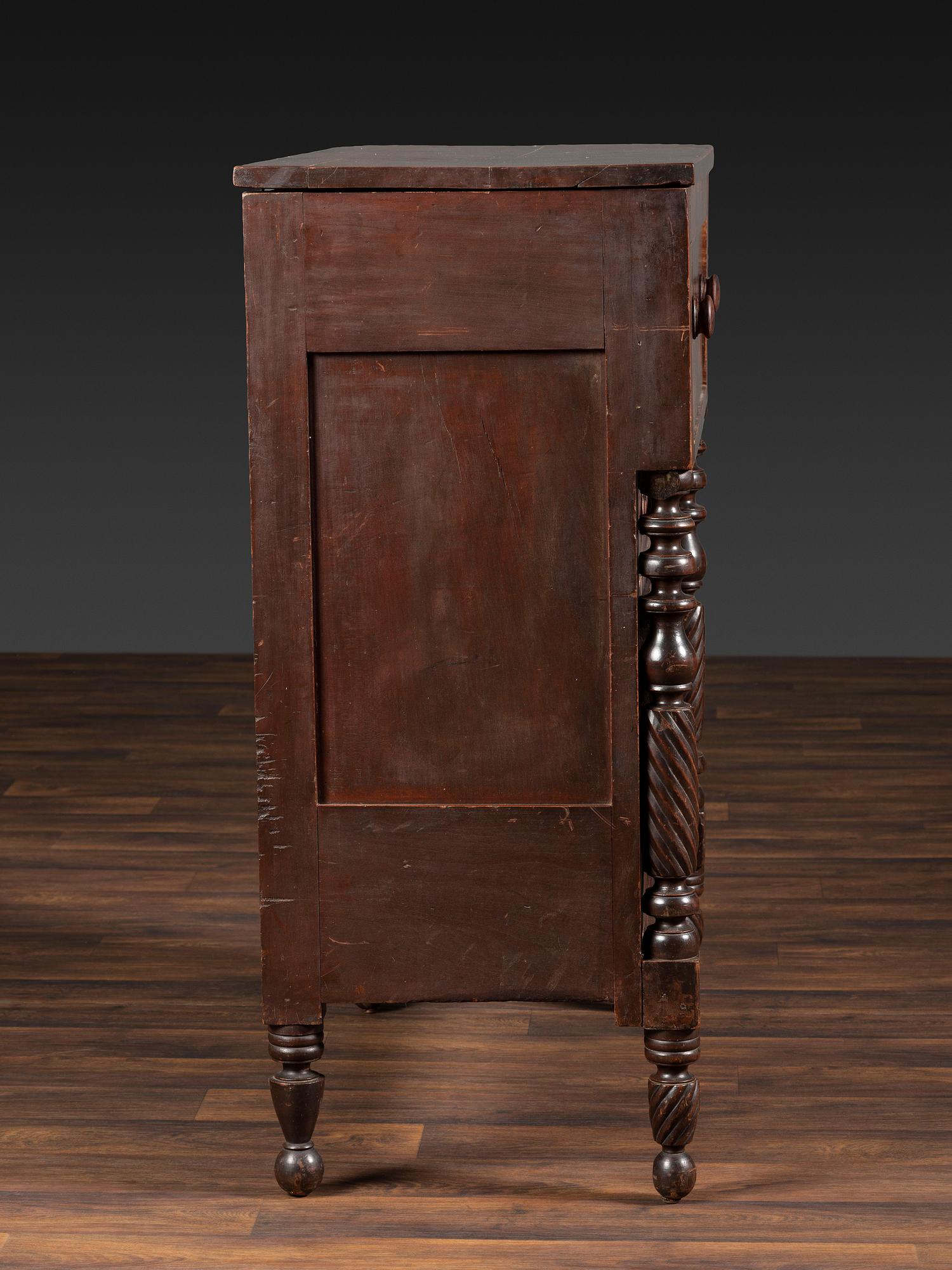 A Classical Tennessee Carved Cherrywood Chest of Drawers