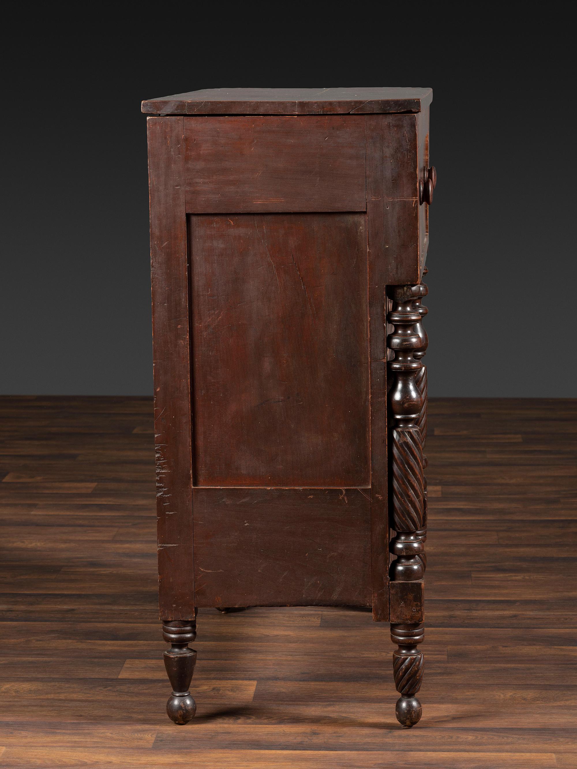 A Classical Tennessee Carved Cherrywood Chest of Drawers