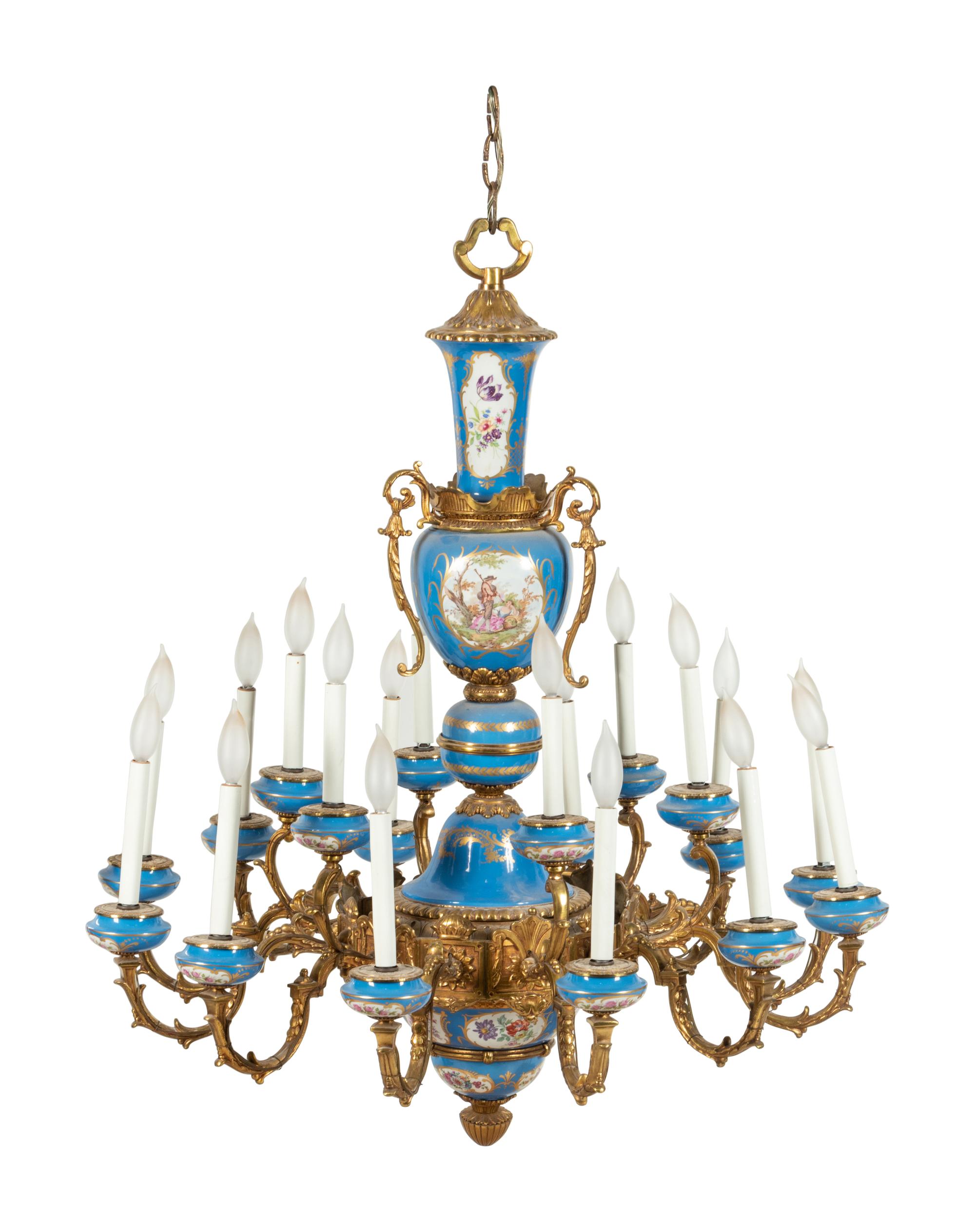A Sèvres Style Painted Glass and Gilt Metal Mounted Eighteen-Light Chandelier