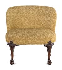 An Oversized George II Style Carved Walnut Slipper Chair