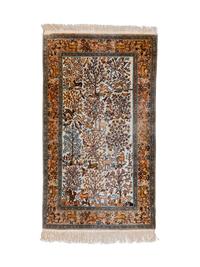 A Kashmir Pictorial Silk and Cotton Rug — 20TH CENTURY