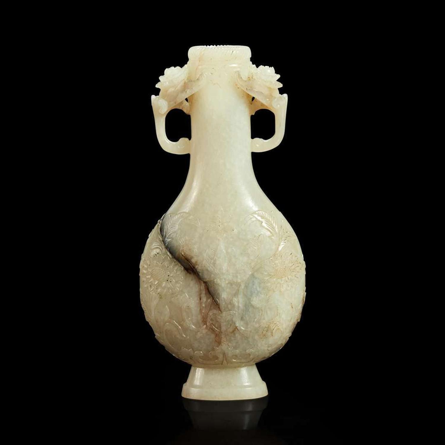 A Chinese carved white jade Mughal style small bottle vase Qing dynasty 18th/19th century