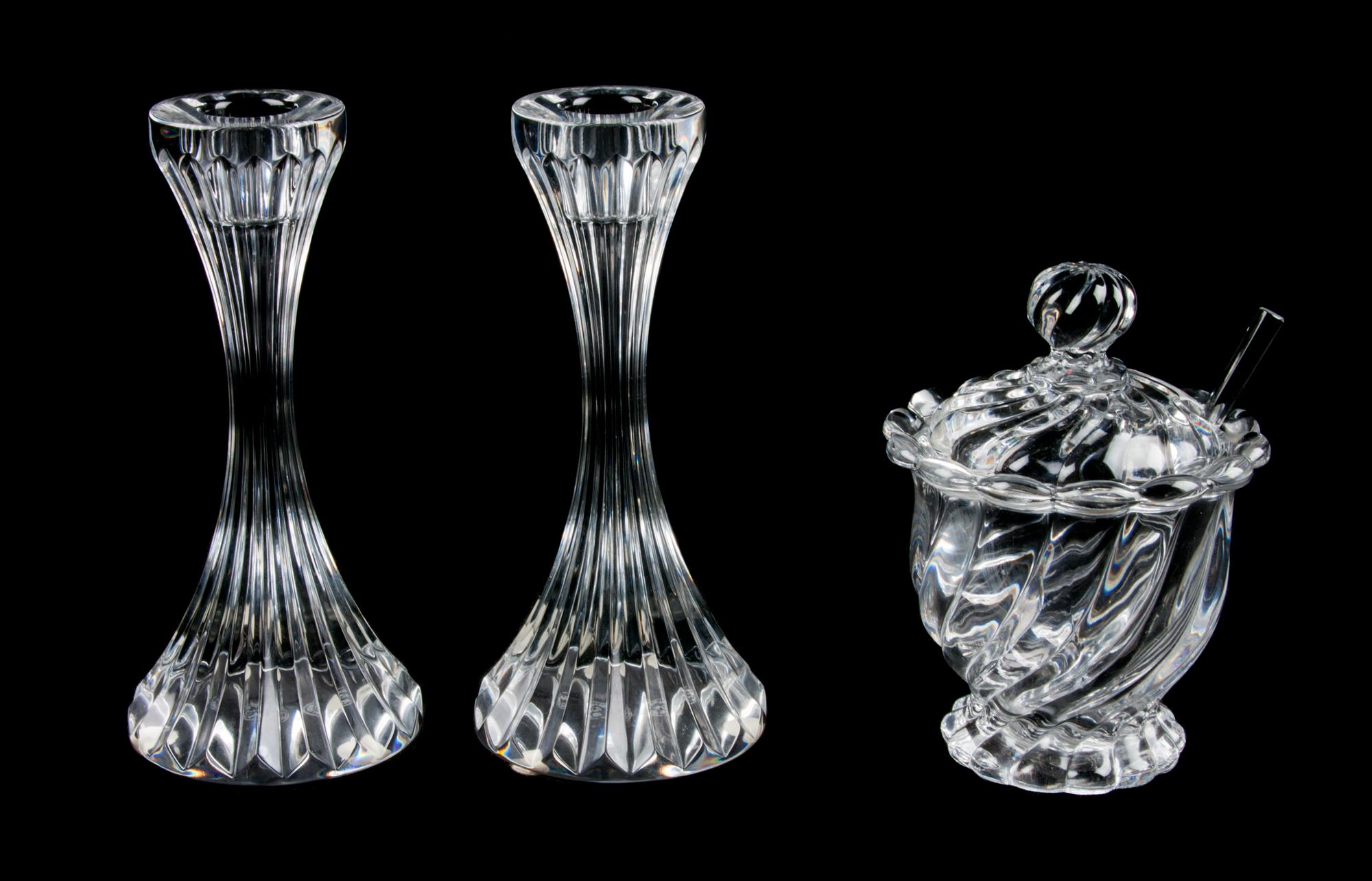A Pair of Baccarat Glass Candlesticks Height of first 6 1/8 inches.