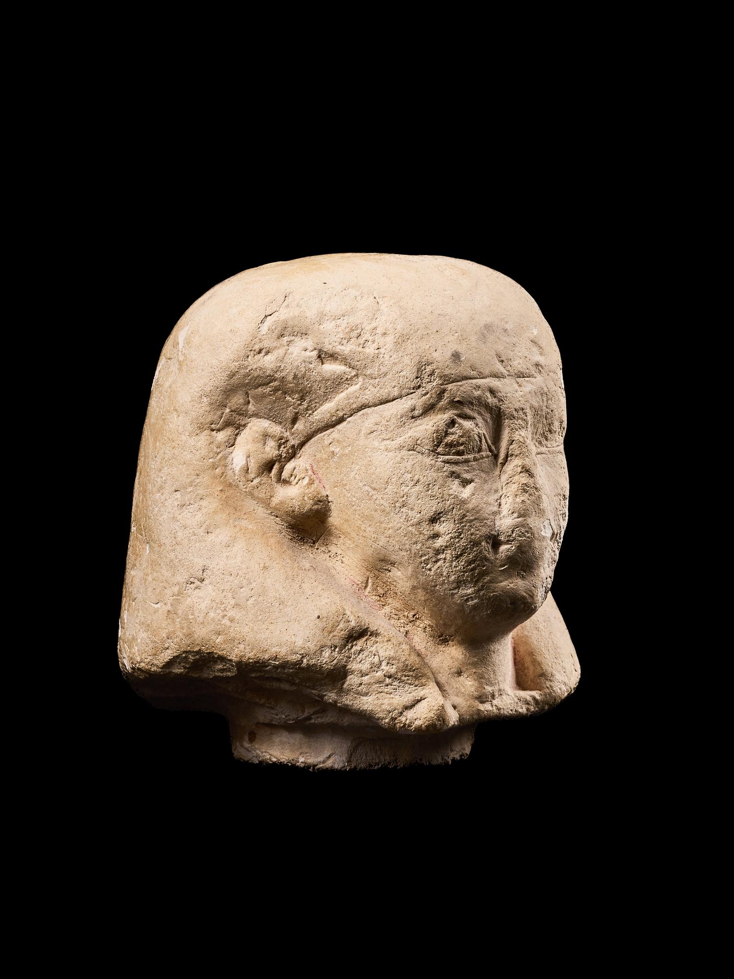 An Egyptian Limestone Canopic Jar Lid for Imseti