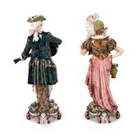 A Pair of Large Continental Glazed Pottery Figures
