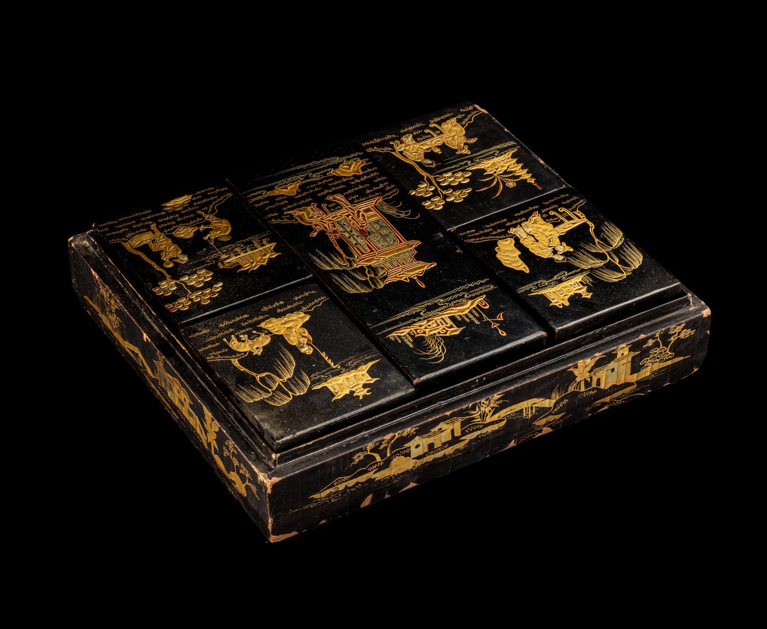 A Chinese Export Gilt and Red Highlighted Black Lacquered Box and Cover