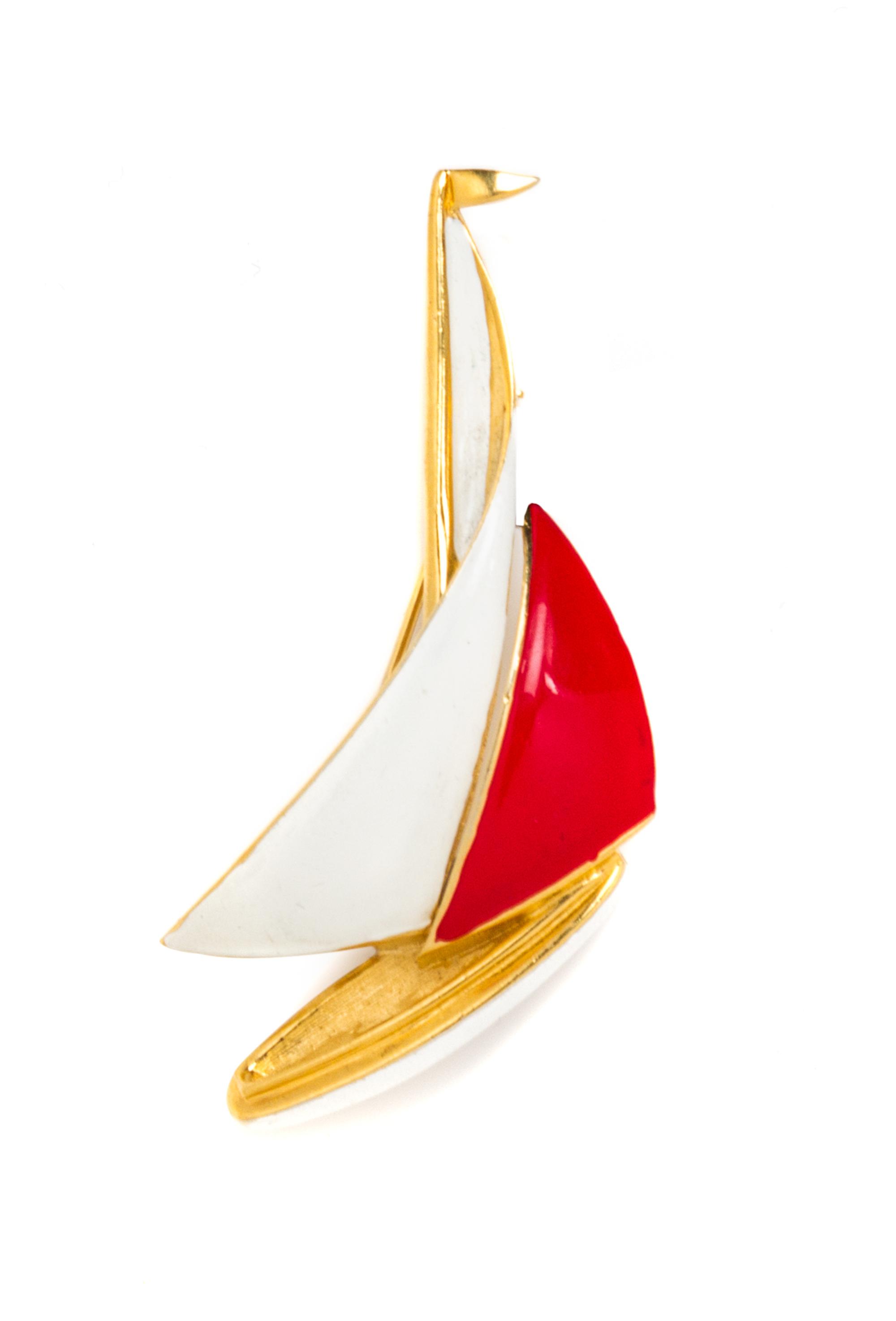 A Trifari Red and White Enamel Sailboat Brooch, 2.5" x 1.5".