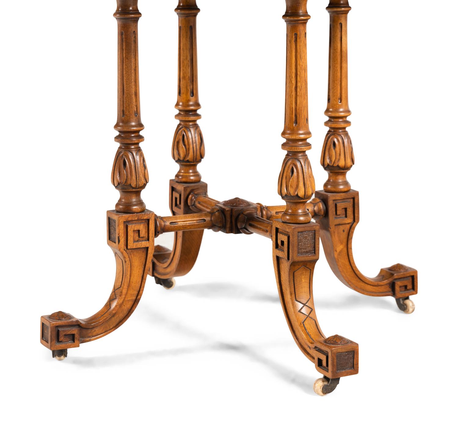 A Neoclassical Walnut Drop-Leaf Table