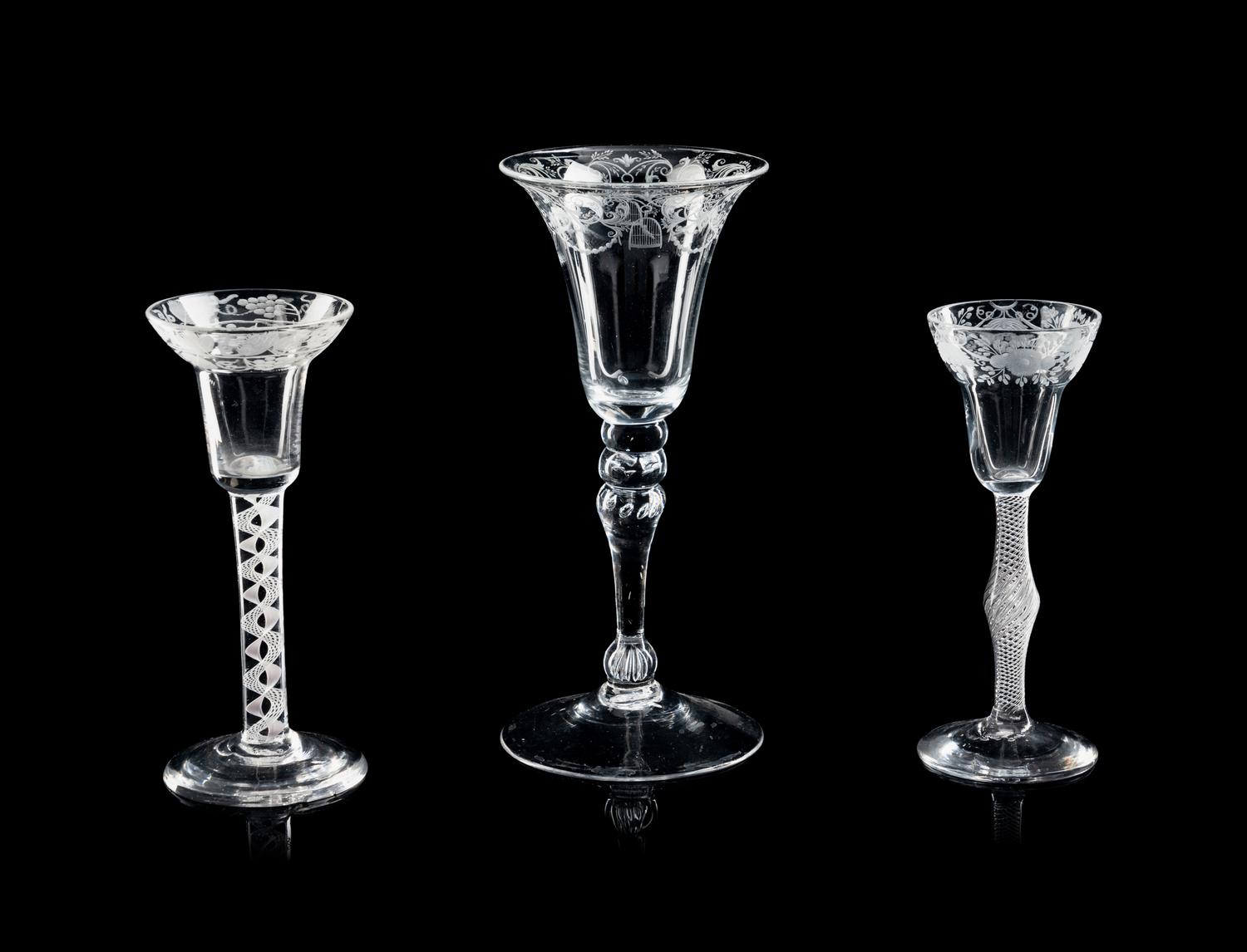 A Group of Three Engraved Wine Glasses