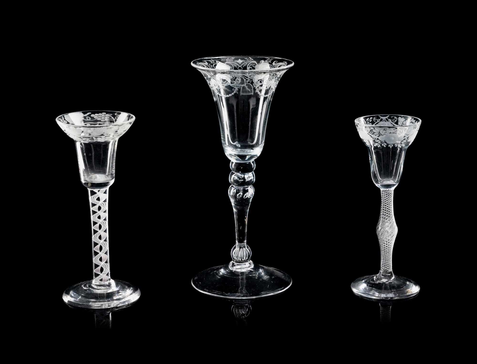A Group of Three Engraved Wine Glasses
