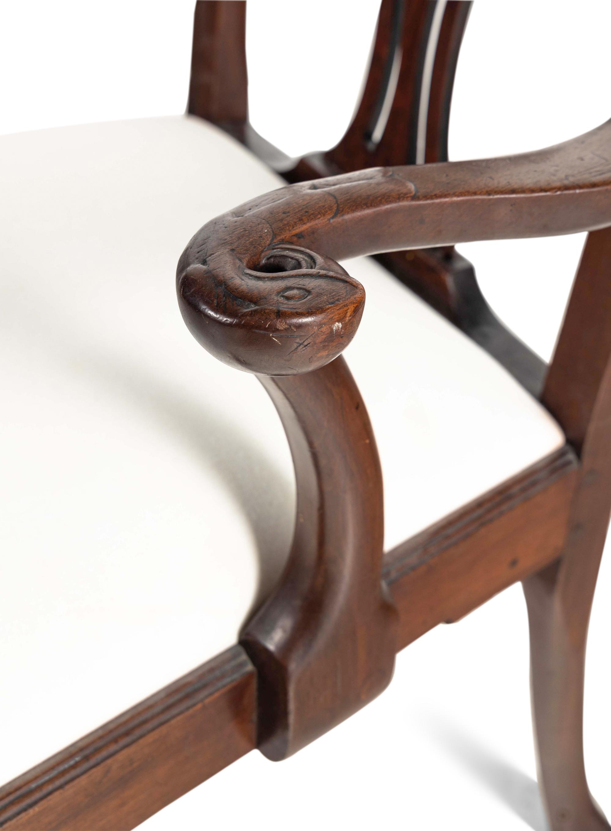 A George III Carved Walnut Open Armchair