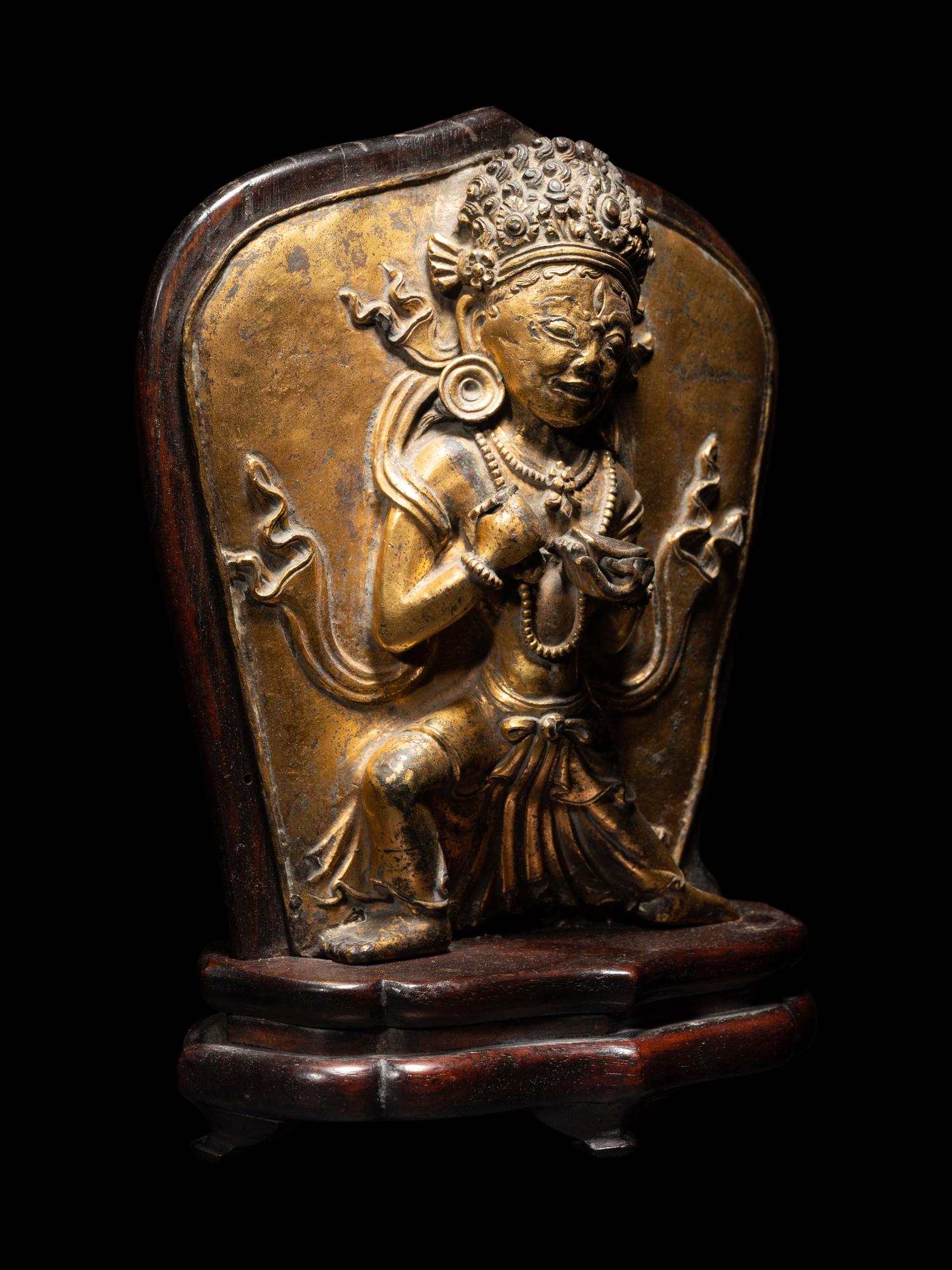 A Tibetan Gilt Bronze Repoussé Vajrapani Panel
