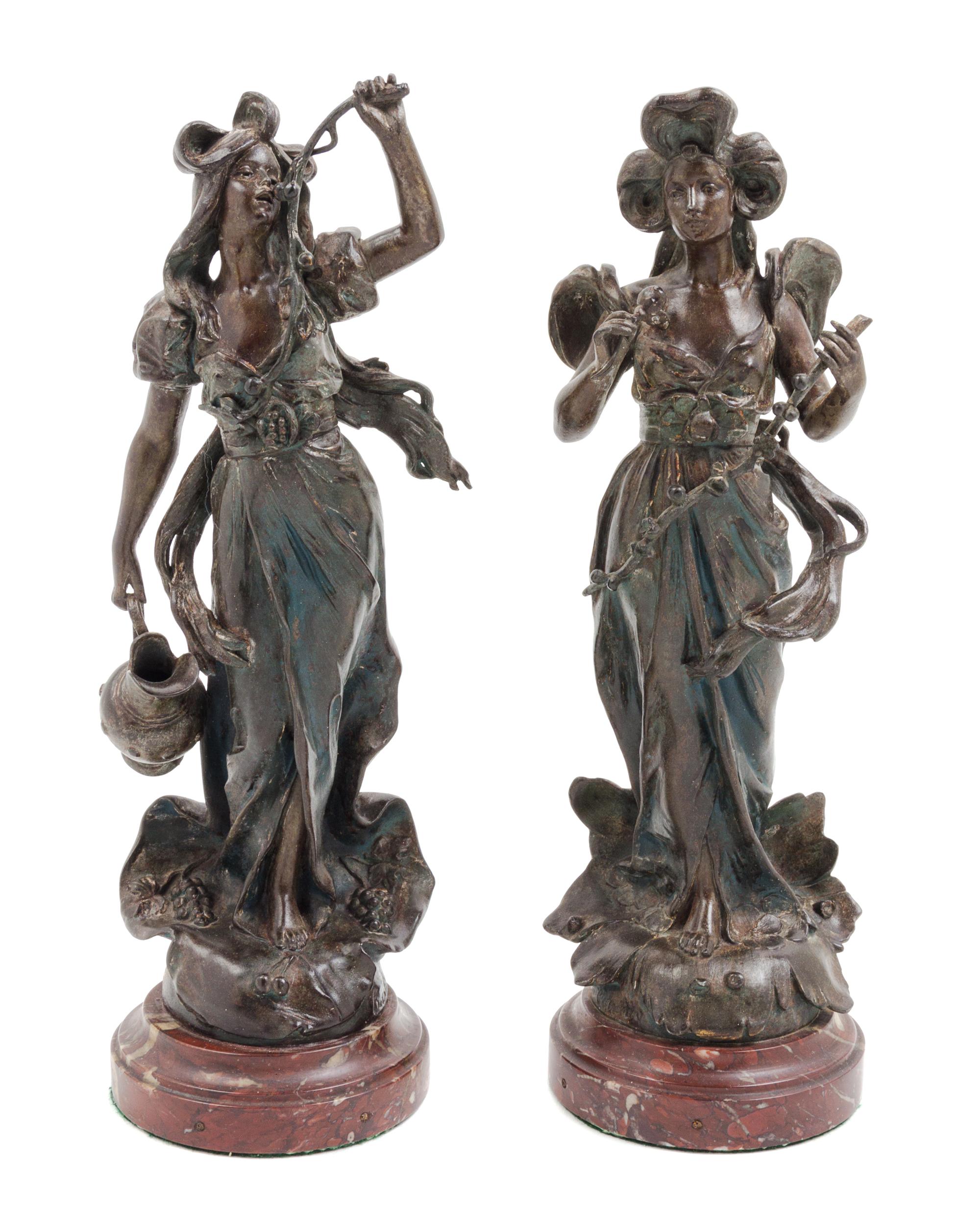 A Pair of Continental Cast Metal Figures Height 14 1/2 inches. — 19TH/20TH CENTURY