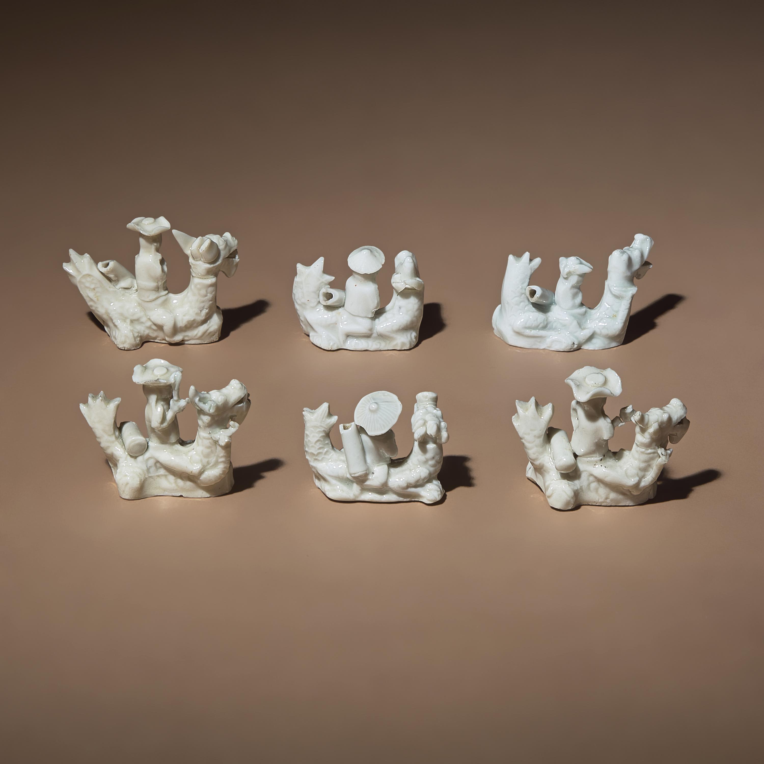 Six Chinese Blanc-de-Chine Porcelain Figural Group-Form Whistles, Late 17th-18th Century — 清早期 德化白瓷塑人像哨六件
