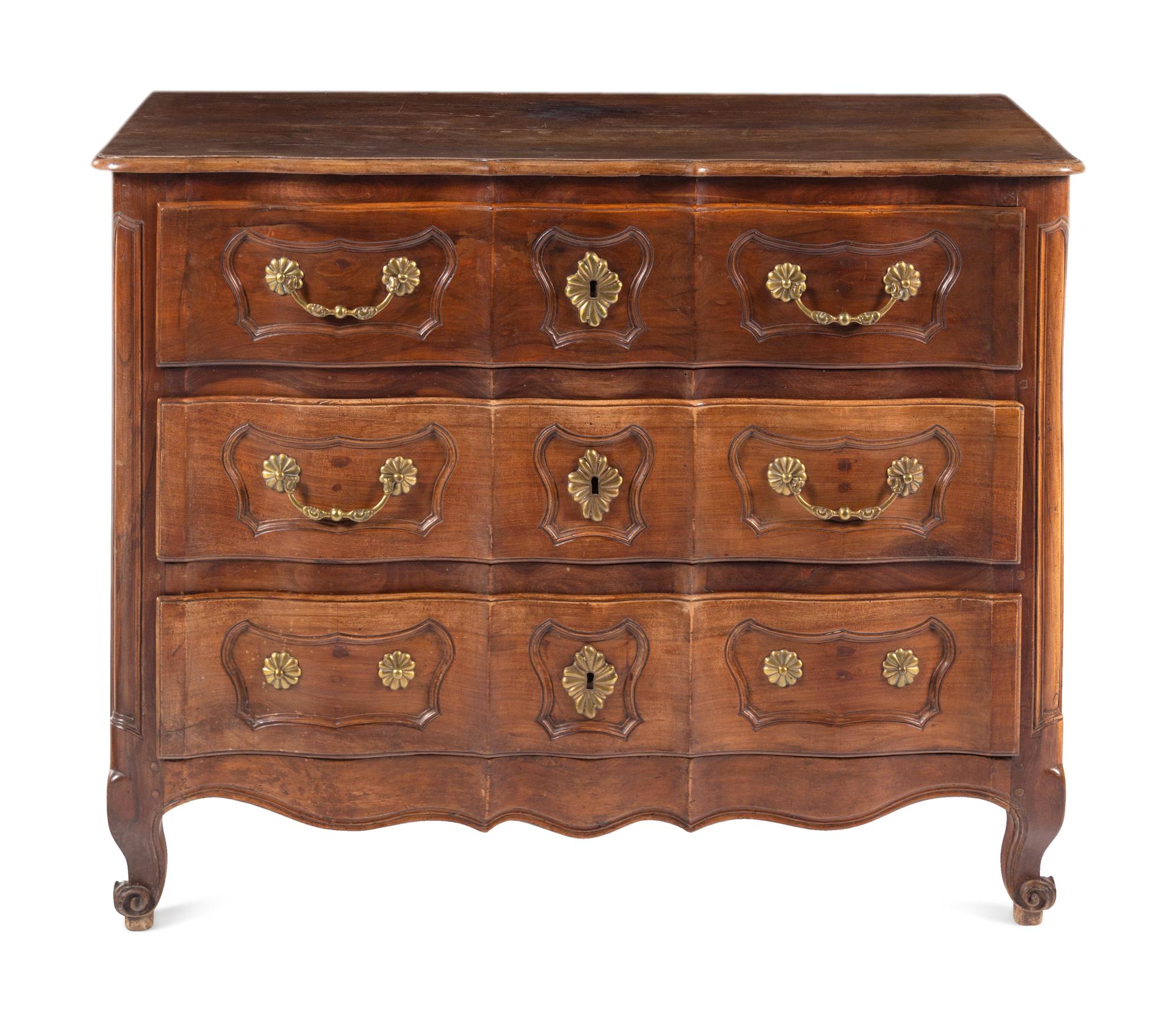 A French Provincial Walnut Serpentine-Front Chest of Drawers