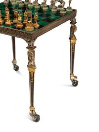 An Italian Gilt and Silvered Bronze Chess Set and Table