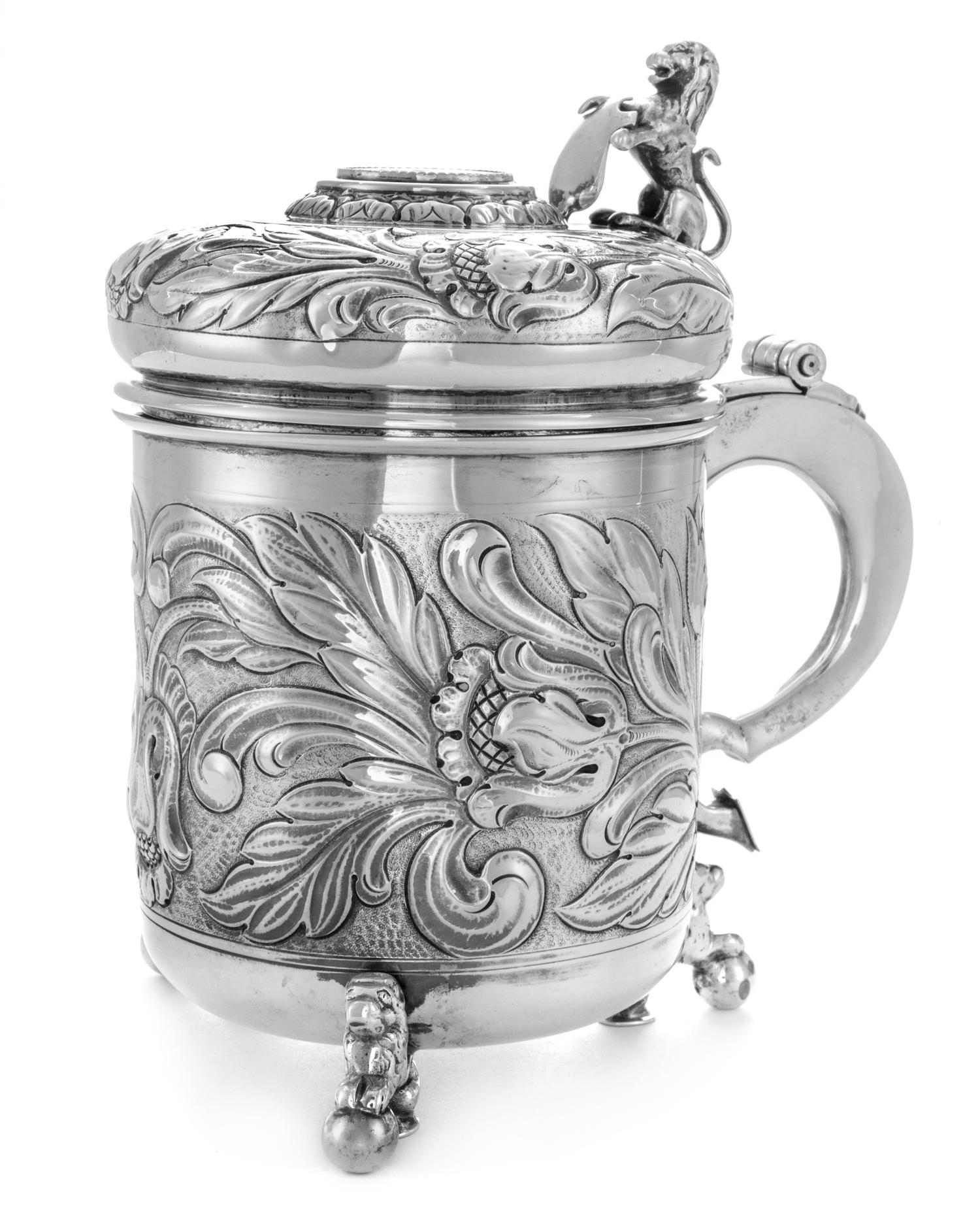 A Danish Silver Tankard, Johannes Siggaard, Copenhagen, Mid-20th Century, of cylindrical form, the body with repousse floral and foliat