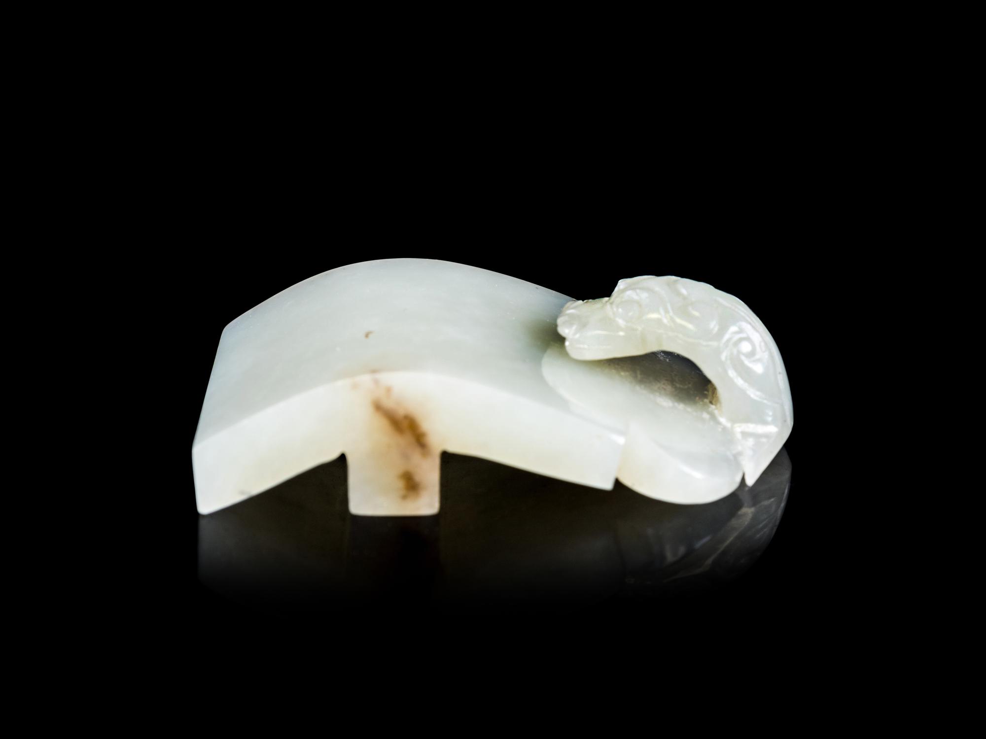 A Chinese Pale Celadon Jade Two-Part Belt Buckle