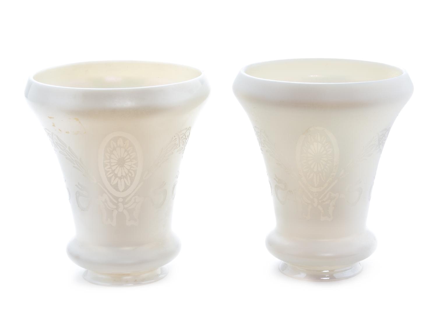 A Pair of Steuben Etched Calcite Glass Shades Height of tallest 5 1/4 inches.