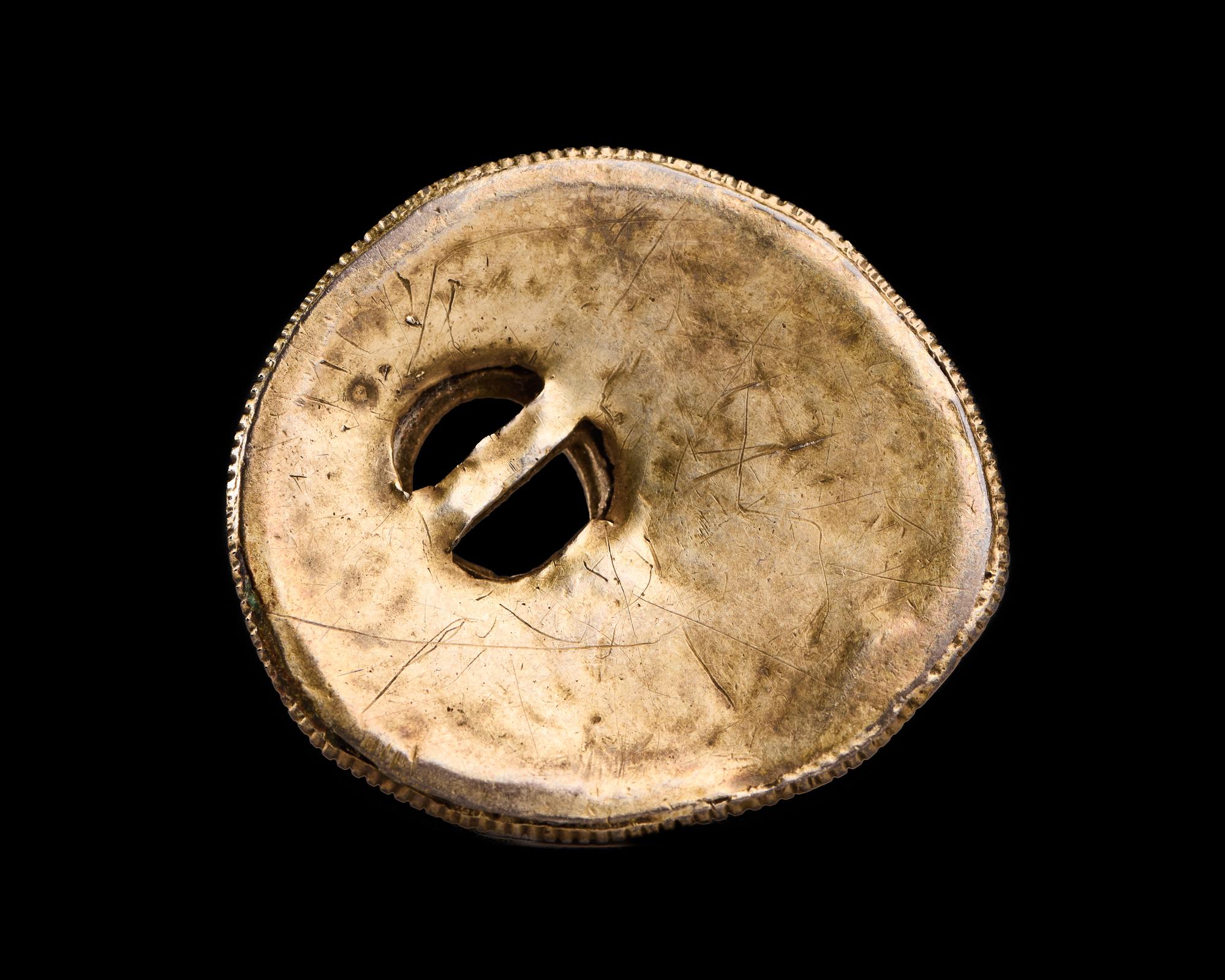 A Scytho-Siberian Gold Buckle in the Form of a Lion