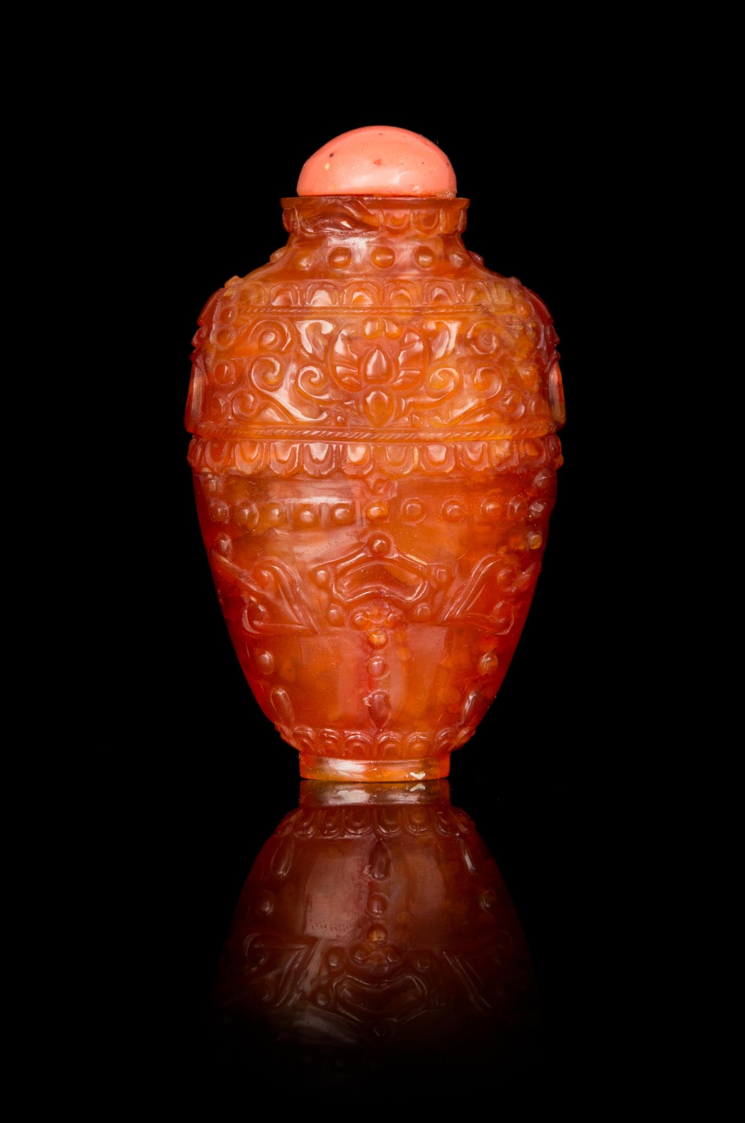 A Carved Canelian Snuff Bottle Height 2 1/2 inches. — 19TH CENTURY