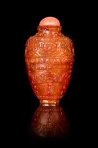 A Carved Canelian Snuff Bottle Height 2 1/2 inches. — 19TH CENTURY