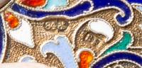 A Russian Enameled Silver Cigarette Case, Mark of Vasilii Rukavishnikov, Moscow, late 19th/early 20th century, the case decorated with