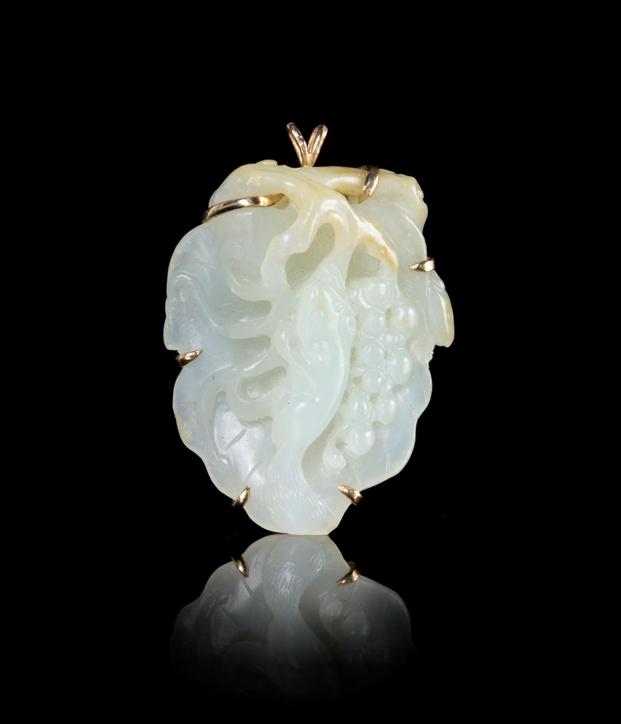 A Carved White Jade and 14K Gold Brooch — 18TH/19TH CENTURY