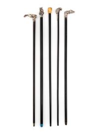 A Group of Five Silver Mounted Zoomorphic Form Walking Sticks