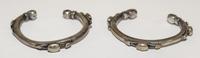 A Pair of Egyptian Silver Bangles Diameter of exterior 2 1/2 inches.