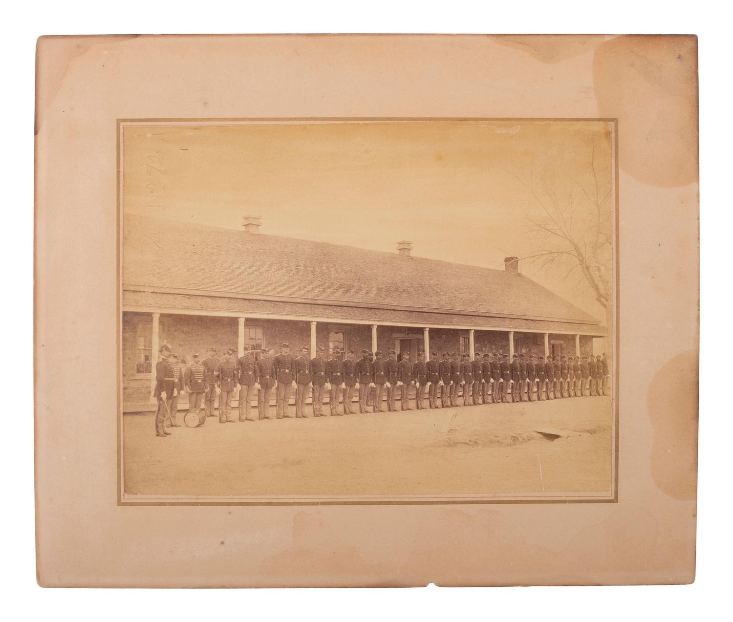 [LATE INDIAN WARS]. [MCKAY, William, photog., attrib.]. 2 photographs of US soldiers near barracks.